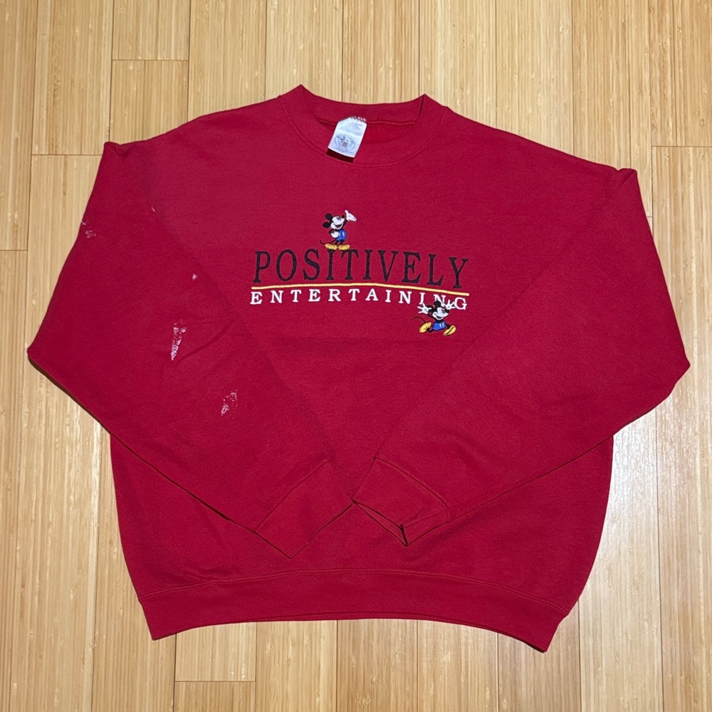 Mickey Mouse Red Sweater. Super comfortable. Some white paint on right arm